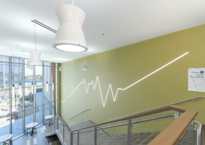 view of staircase and LED wall design inside of Betty Engelstad School of Health Sciences, College of Southern Nevada